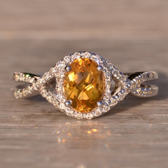 Oval Checkerboard Cut Citrine and Diamond Halo Ring in White Gold